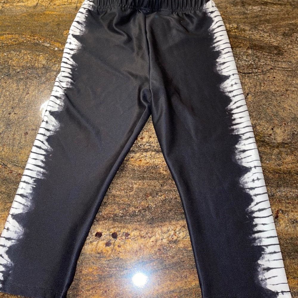 Kids More than Magic Black capri with‎ white designs medium 7/8